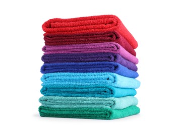Photo of Stack of bright terry towels isolated on white