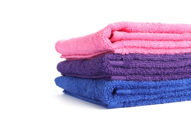 Photo of Stack of bright terry towels isolated on white