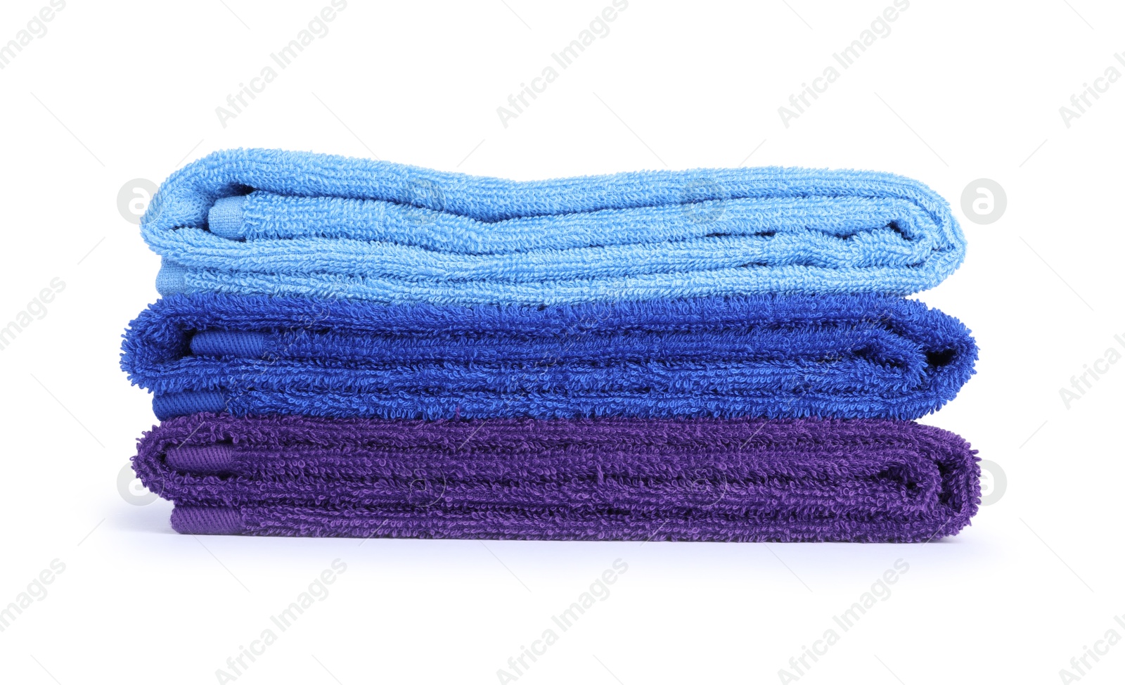 Photo of Stack of bright terry towels isolated on white