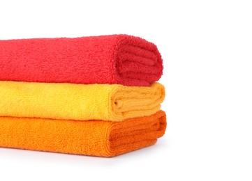 Photo of Stack of bright terry towels isolated on white