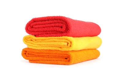 Photo of Stack of bright terry towels isolated on white