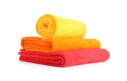 Photo of Stack of bright terry towels isolated on white