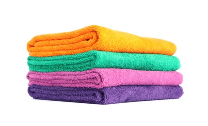 Photo of Stack of bright terry towels isolated on white