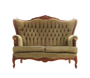 Photo of One stylish sofa isolated on white. Used stuff