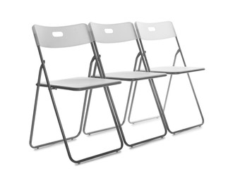 Photo of Many stylish chairs isolated on white. Used stuff