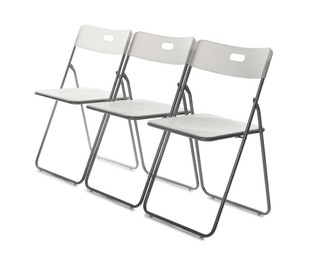 Photo of Many stylish chairs isolated on white. Used stuff