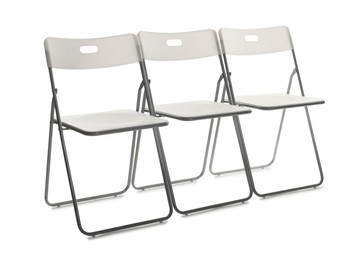 Photo of Many stylish chairs isolated on white. Used stuff