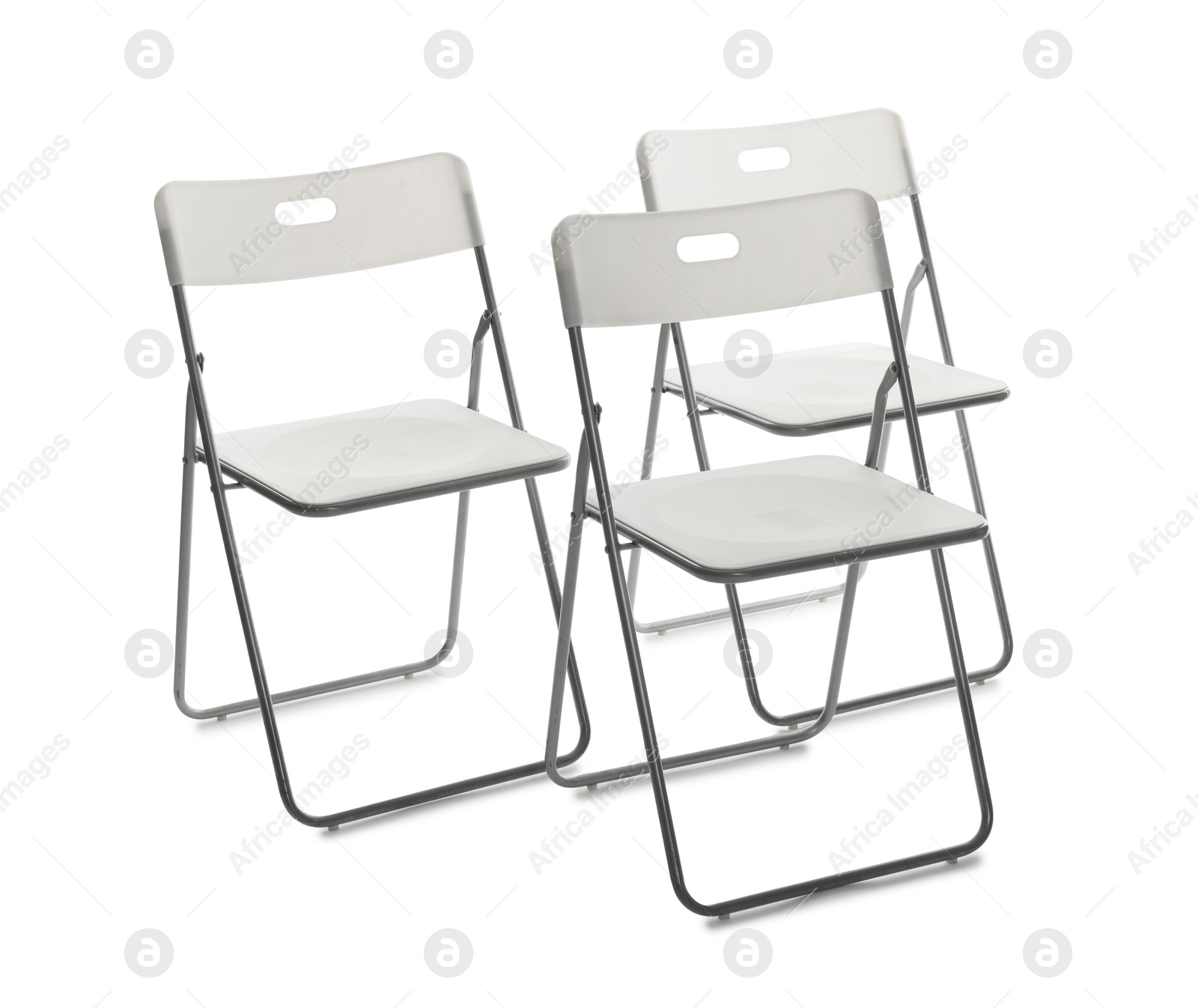 Many stylish chairs isolated on white. Used stuff Photo of Many stylish chairs isolated on white. Used stuff