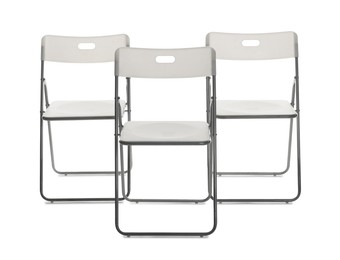 Photo of Many stylish chairs isolated on white. Used stuff