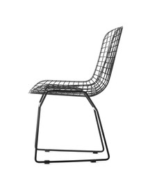 Photo of Stylish metal chair isolated on white. Used stuff