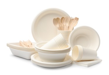 Photo of Set of disposable tableware isolated on white