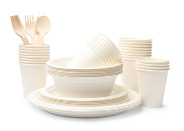 Photo of Set of disposable tableware isolated on white
