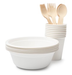Photo of Set of disposable tableware isolated on white