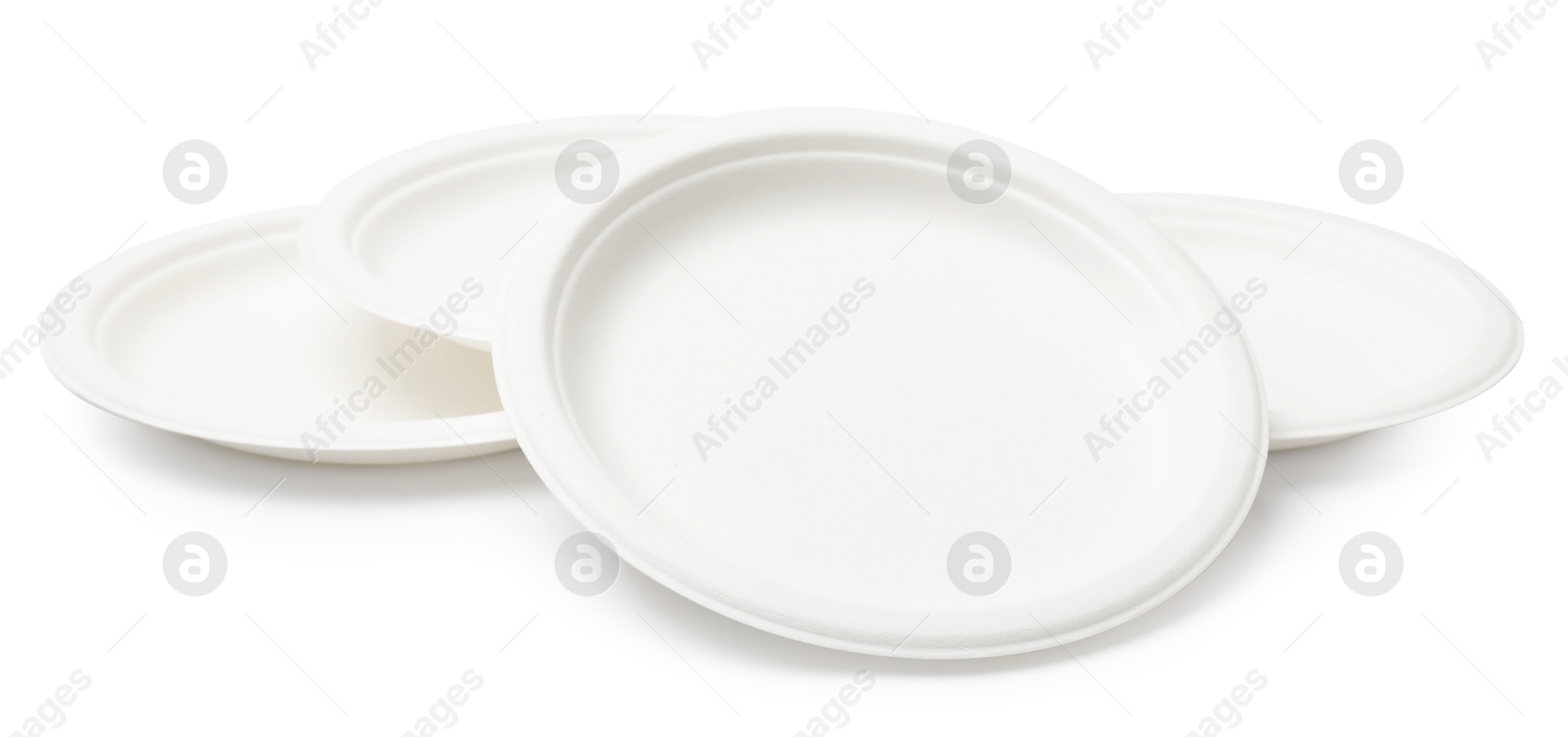 Photo of Many different disposable plates isolated on white