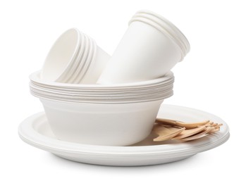 Photo of Set of disposable tableware isolated on white