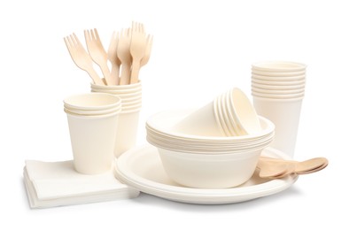 Photo of Set of disposable tableware isolated on white