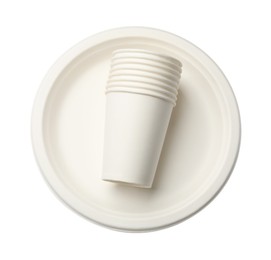 Photo of Disposable plates and cups isolated on white, top view