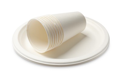 Photo of Disposable plates and cups isolated on white