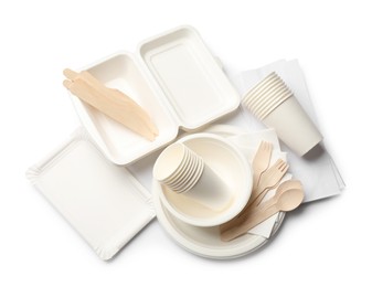 Photo of Set of disposable tableware and napkins isolated on white, top view