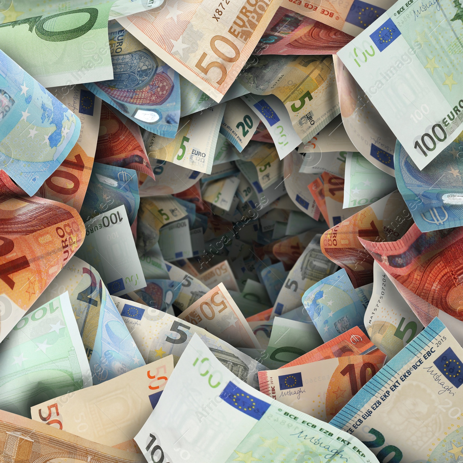 Image of Money vortex. Euro bills swirling in air