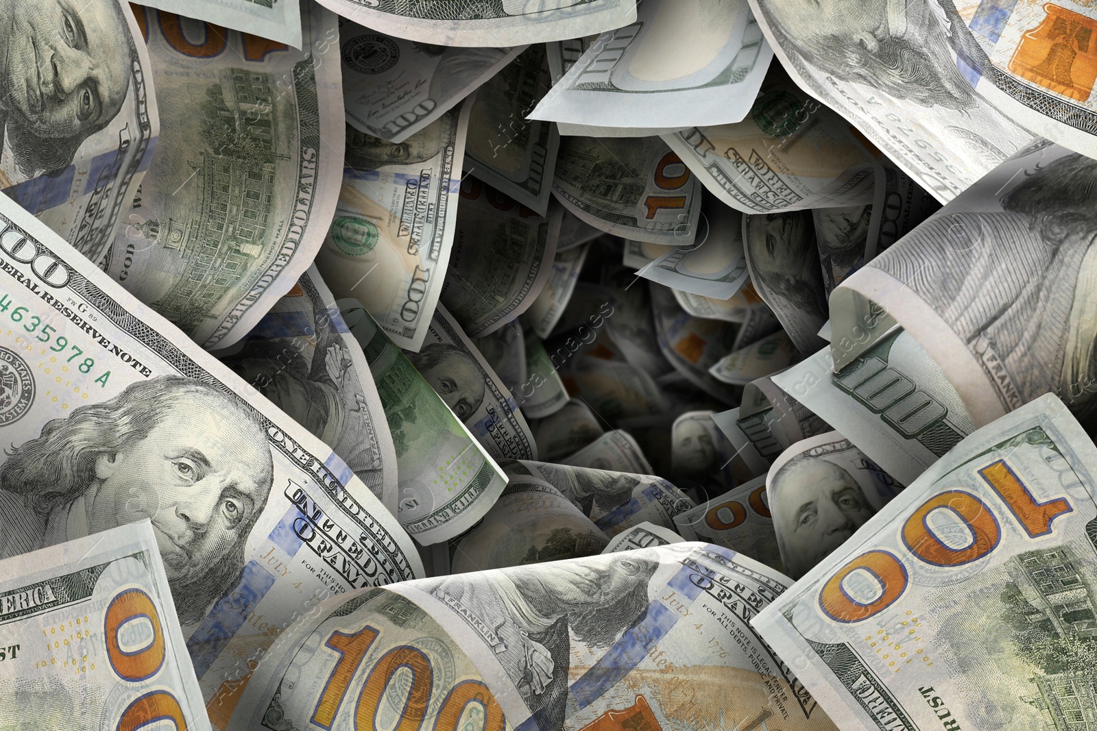 Image of Money vortex. Dollar bills swirling in air
