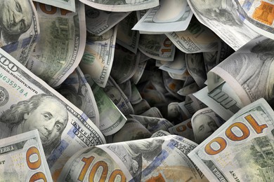 Image of Money vortex. Dollar bills swirling in air