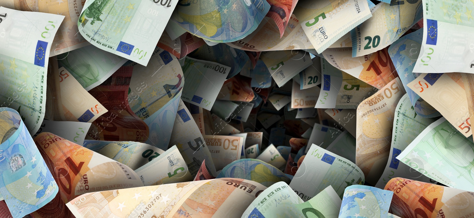 Image of Money vortex. Euro bills swirling in air
