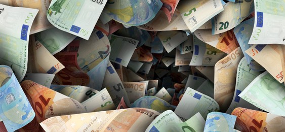 Image of Money vortex. Euro bills swirling in air
