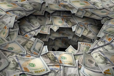 Image of Money vortex. Dollar bills swirling in air