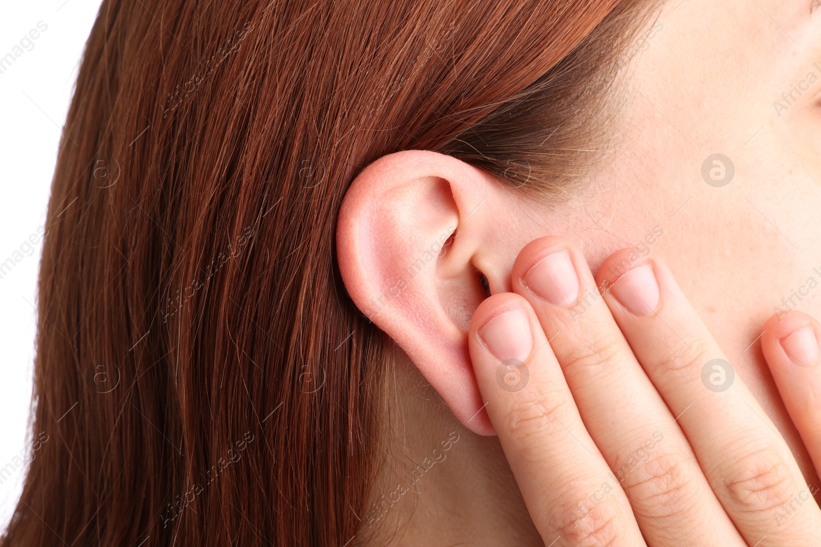 Photo of Sound. Woman touching her ear on white background, closeup