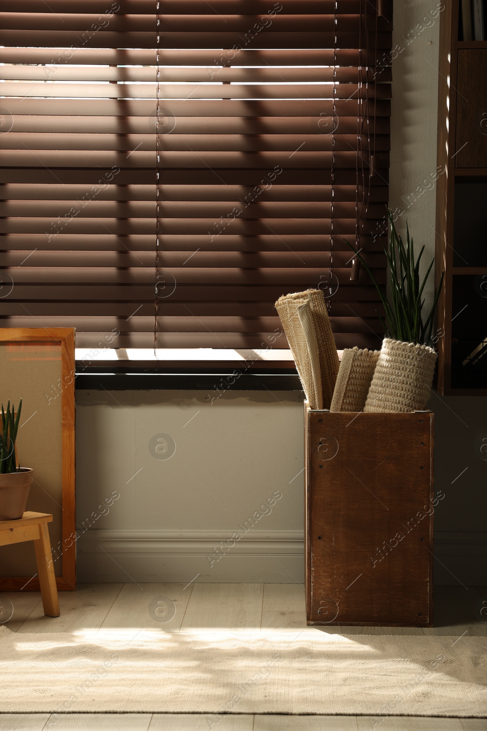Photo of Many different used stuff near window indoors