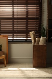 Photo of Many different used stuff near window indoors