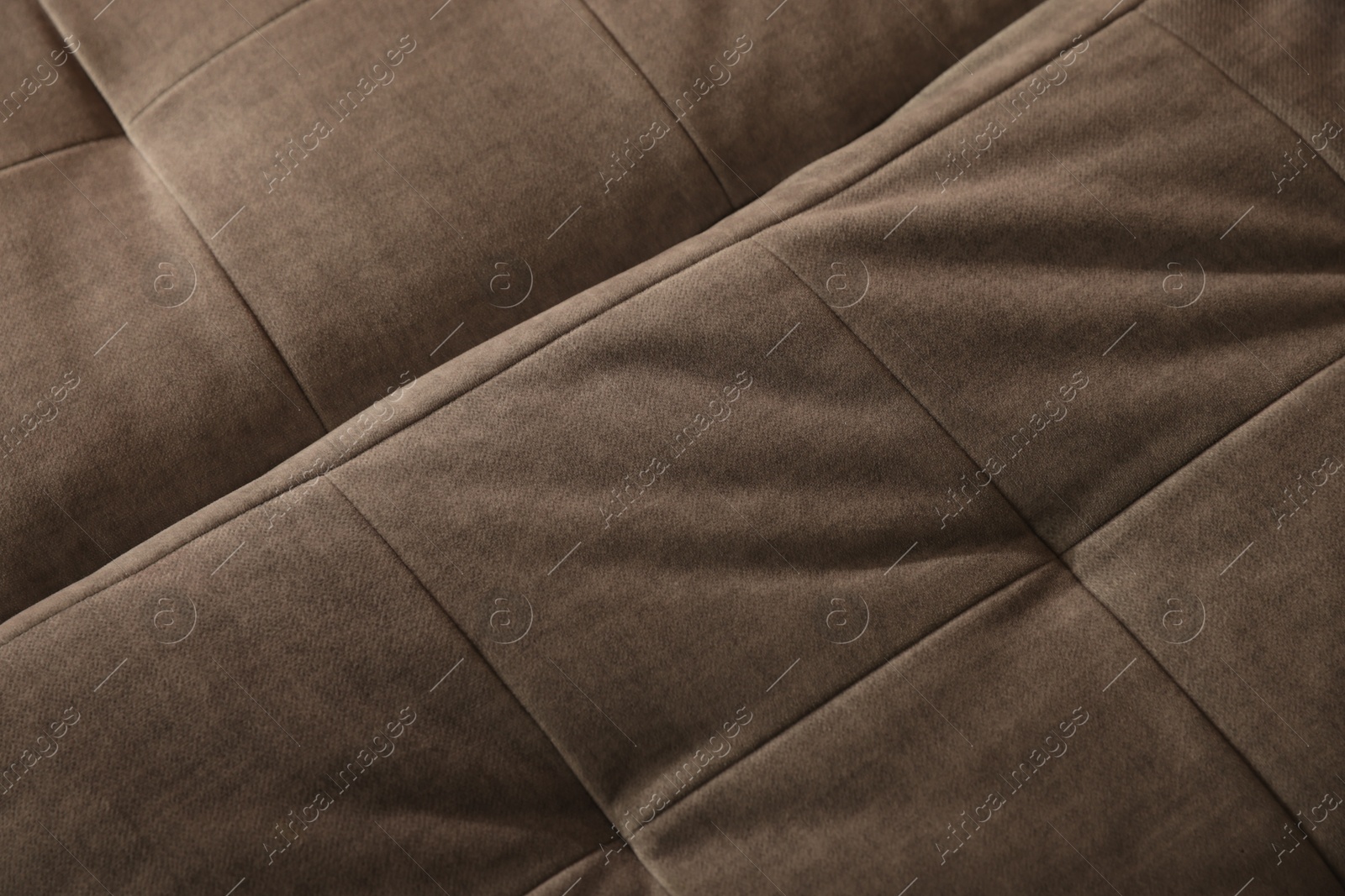Photo of Soft sofa as background, above view. Used stuff