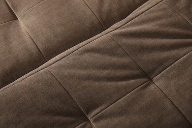 Photo of Soft sofa as background, above view. Used stuff