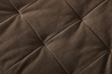 Photo of Soft sofa as background, top view. Used stuff