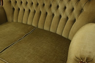 Photo of Soft sofa as background, closeup. Used stuff