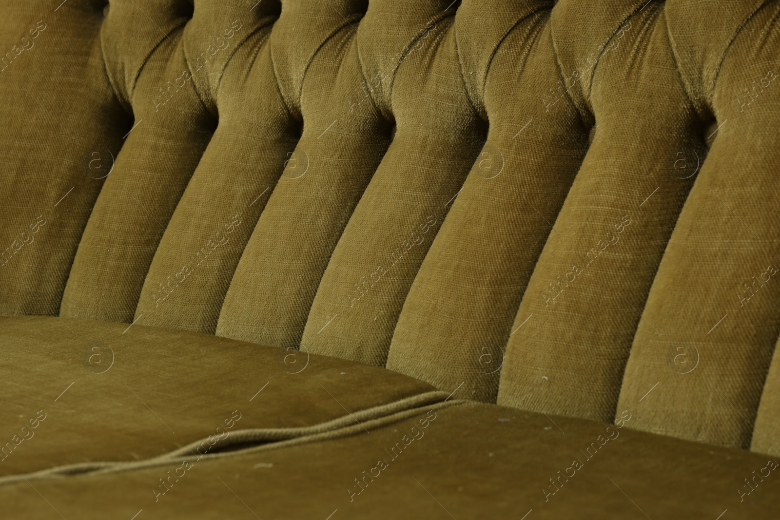 Photo of Soft sofa as background, closeup. Used stuff