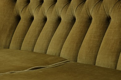 Photo of Soft sofa as background, closeup. Used stuff
