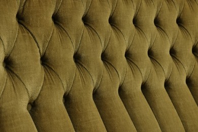 Photo of Soft sofa as background, closeup. Used stuff