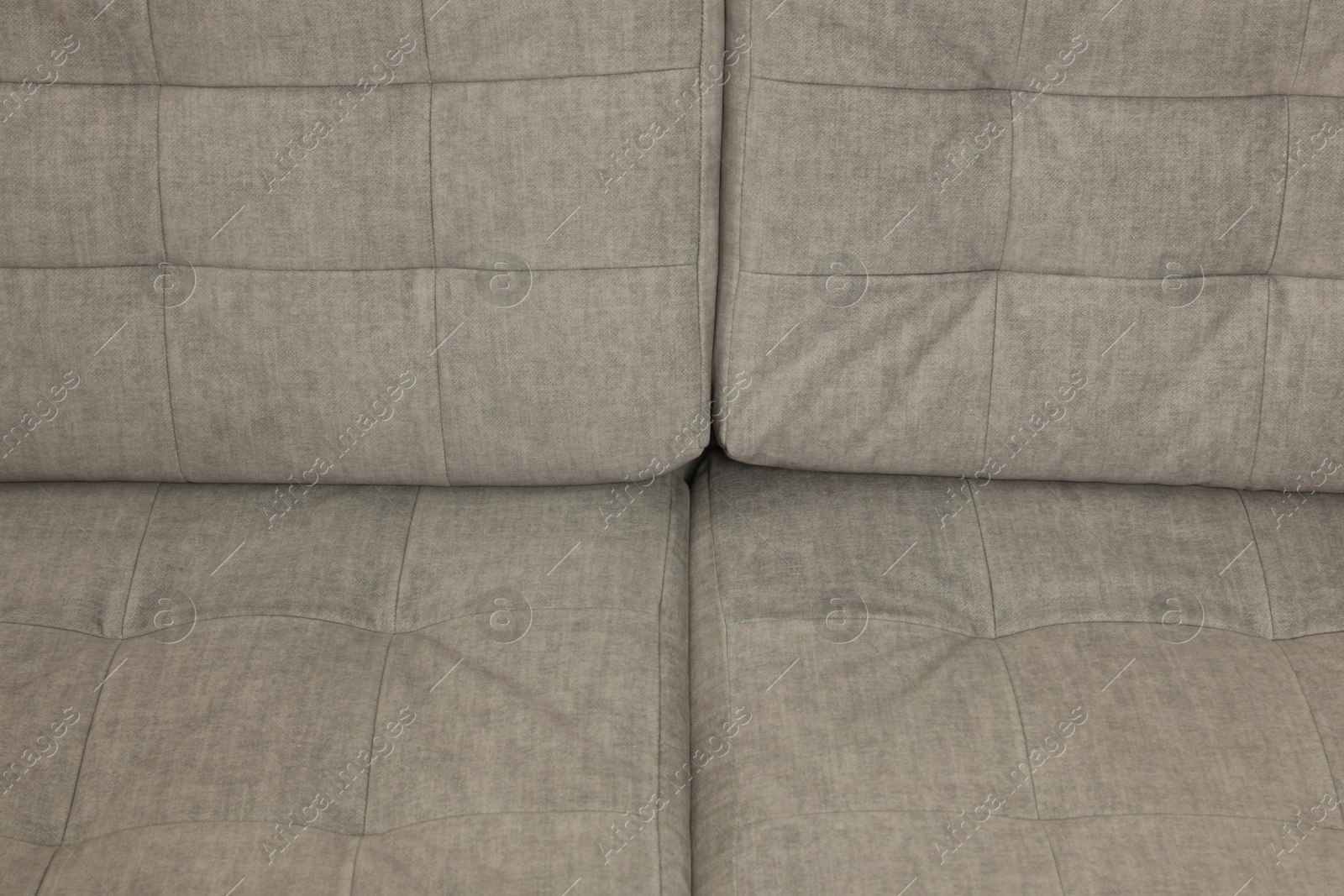Photo of Soft sofa as background, above view. Used stuff
