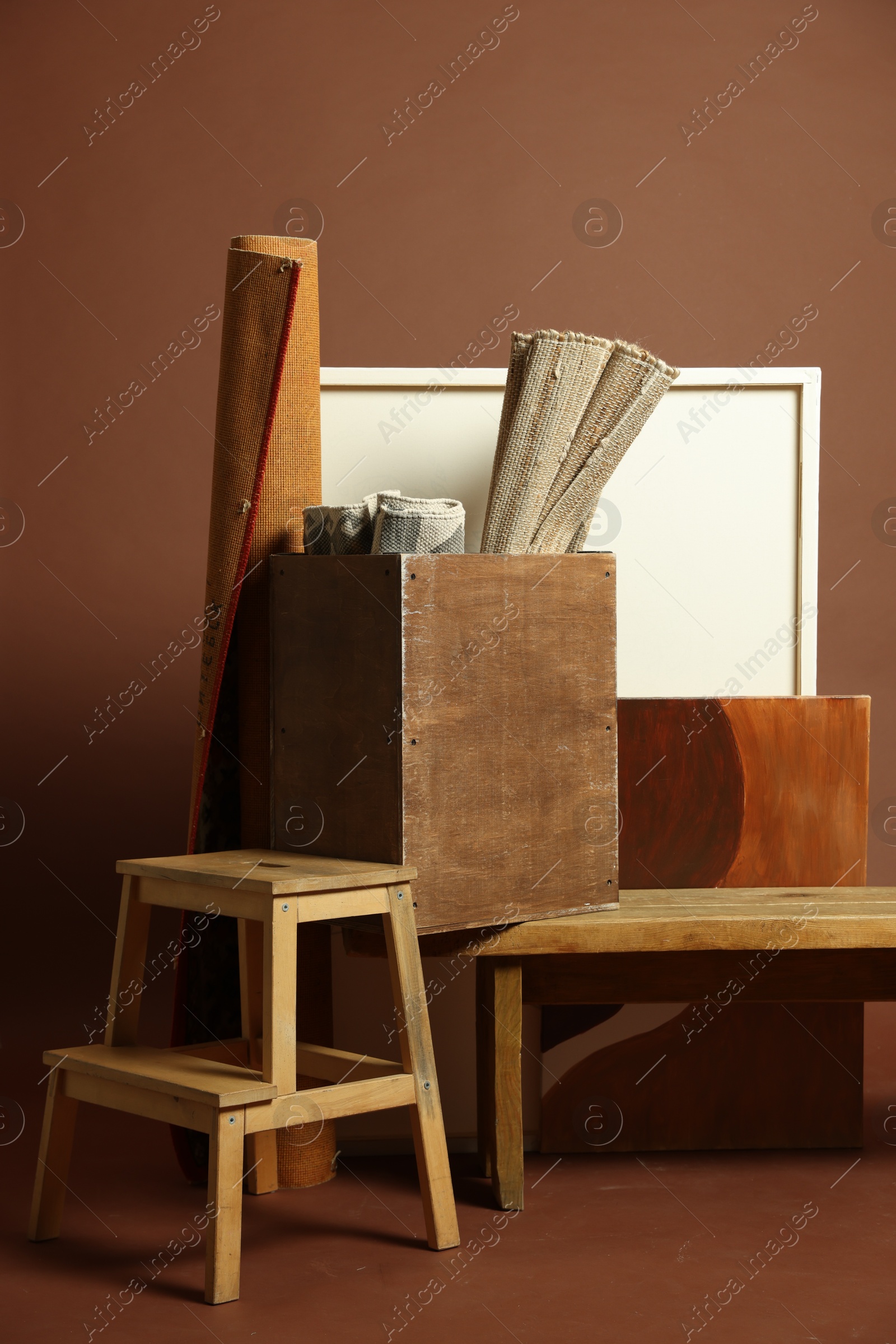 Photo of Many different used stuff on brown background