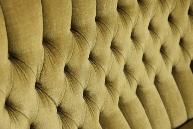 Photo of Soft sofa as background, closeup. Used stuff