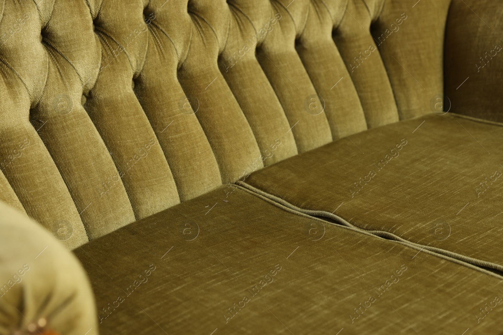 Photo of Soft sofa as background, closeup. Used stuff