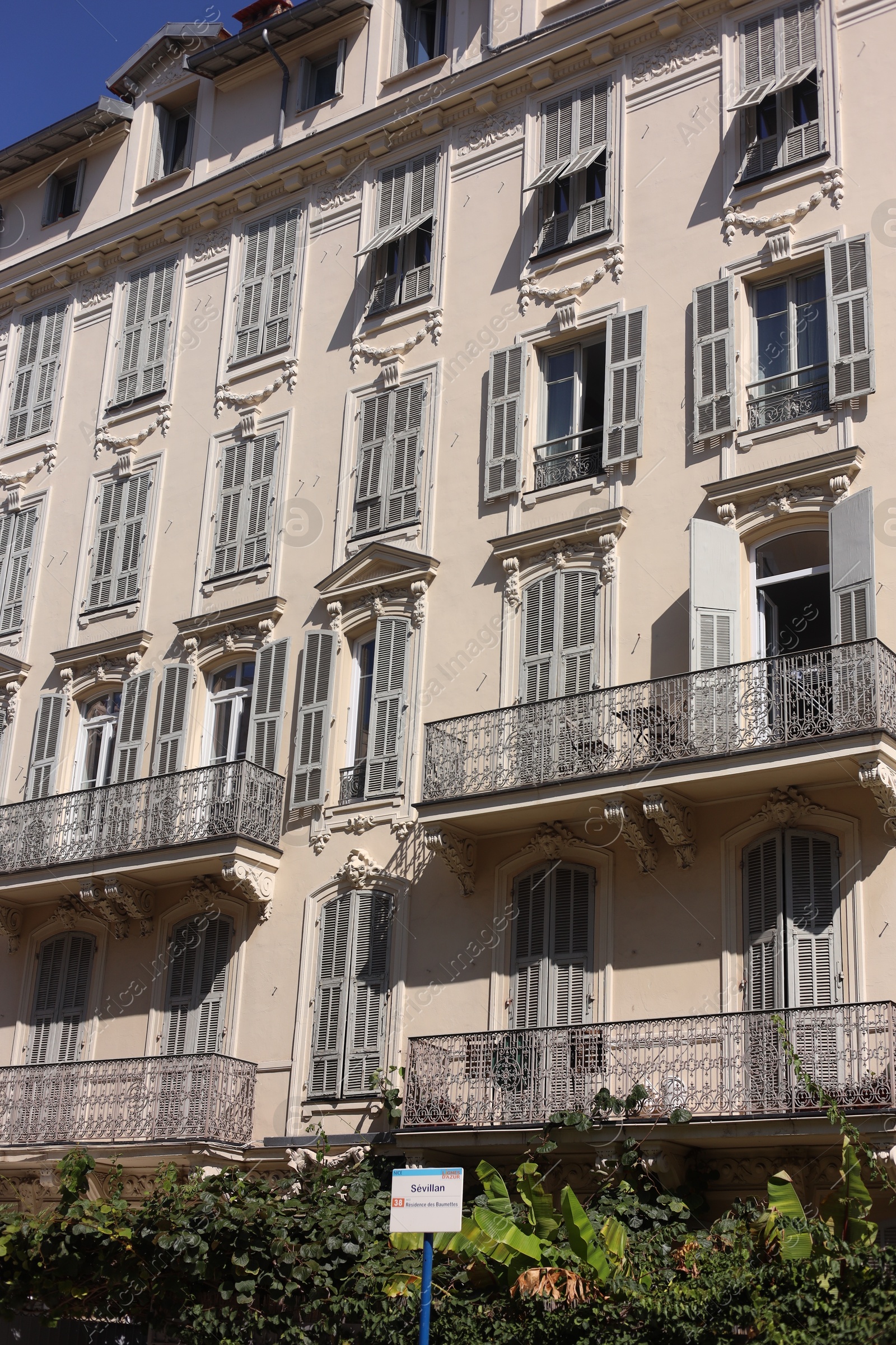 Nice, France - August 23, 2025: Beautiful building with windows and balconies in city Photo of Nice, France - August 23, 2025: Beautiful building with windows and balconies in city