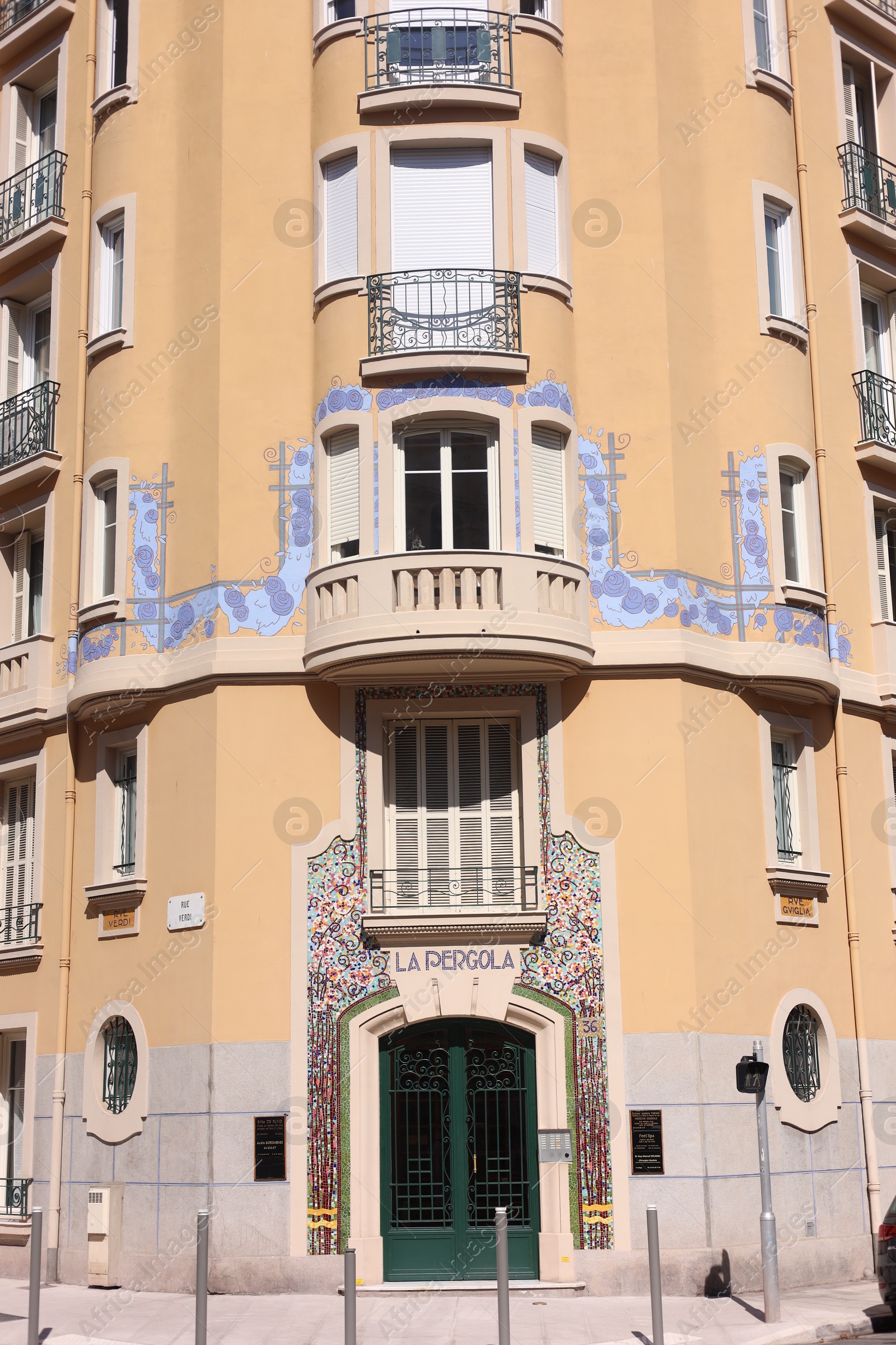 Nice, France - August 23, 2025: Beautiful building with windows and balconies in city Photo of Nice, France - August 23, 2025: Beautiful building with windows and balconies in city