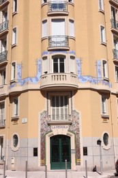 Photo of Nice, France - August 23, 2025: Beautiful building with windows and balconies in city