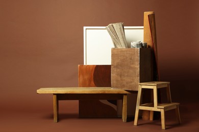 Photo of Many different used stuff on brown background