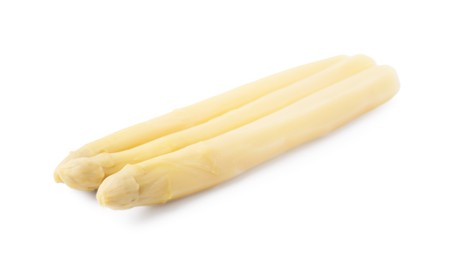 Photo of Spears of pickled asparagus isolated on white