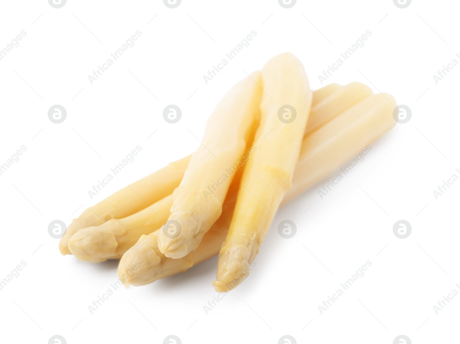 Photo of Spears of pickled asparagus isolated on white
