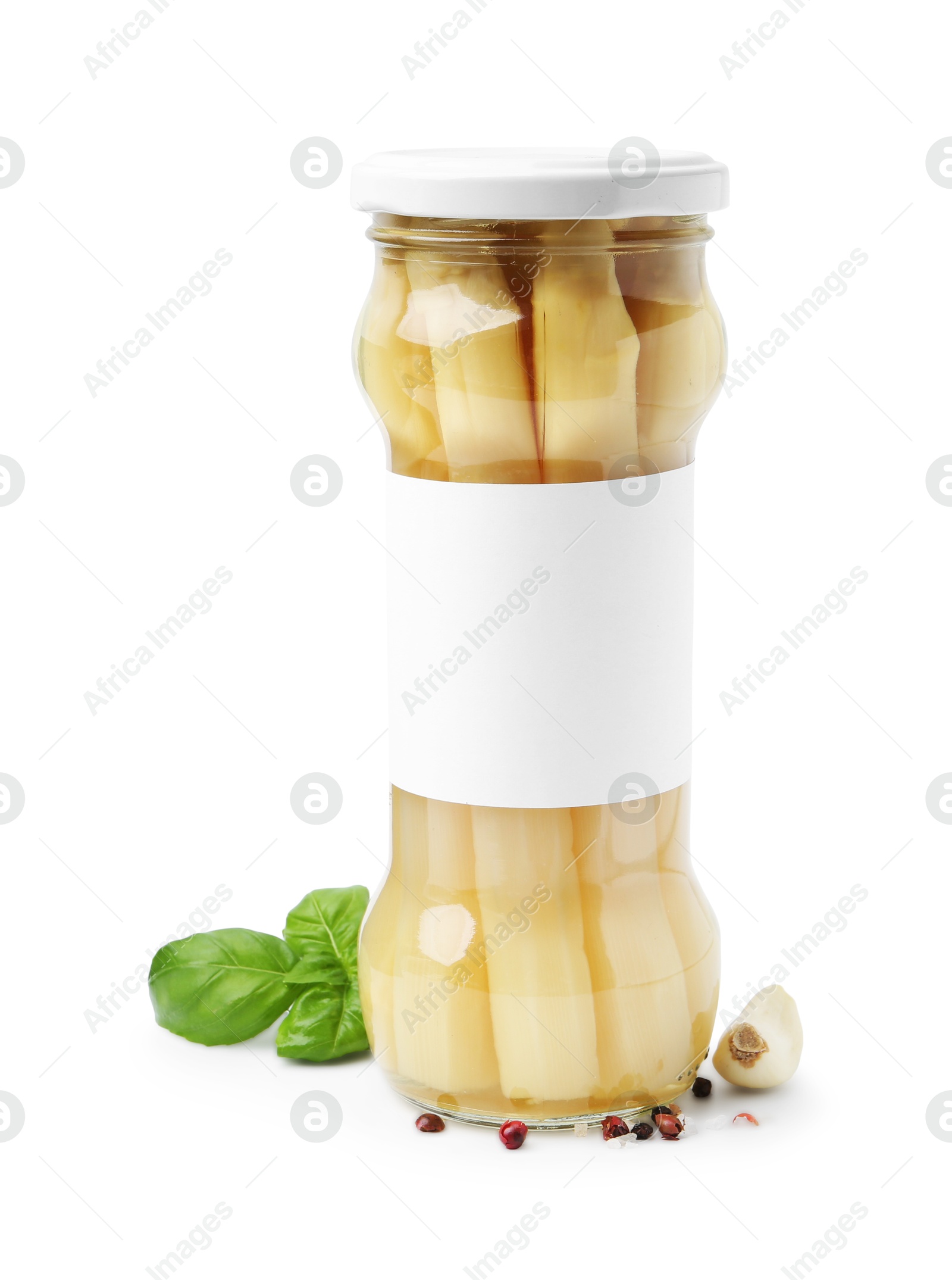 Photo of Pickled asparagus in jar and spices isolated on white